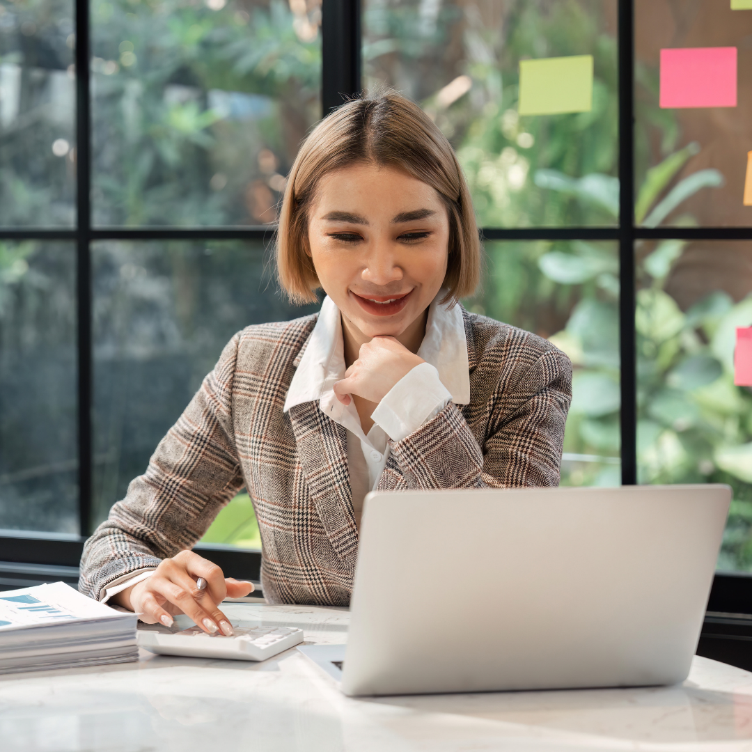 Canadian finance professional reviewing financial reports